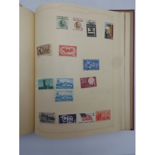 7045 - A worldwide stamp collection in four albums including 1 album of  GB with early phosphor sets, one a... 