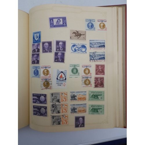 7045 - A worldwide stamp collection in four albums including 1 album of  GB with early phosphor sets, one a...