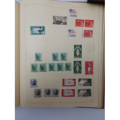 7045 - A worldwide stamp collection in four albums including 1 album of  GB with early phosphor sets, one a... 