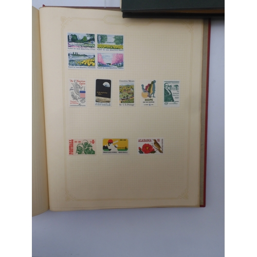 7045 - A worldwide stamp collection in four albums including 1 album of  GB with early phosphor sets, one a... 