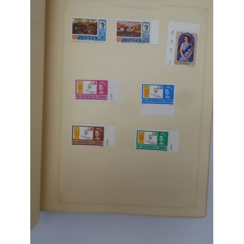 7045 - A worldwide stamp collection in four albums including 1 album of  GB with early phosphor sets, one a...