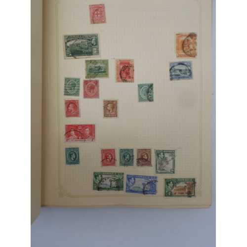 7045 - A worldwide stamp collection in four albums including 1 album of  GB with early phosphor sets, one a...