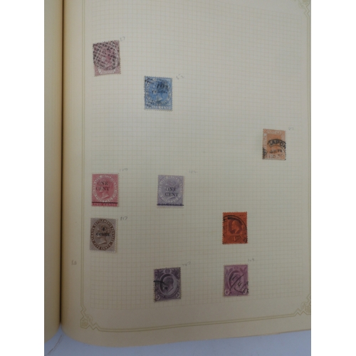 7045 - A worldwide stamp collection in four albums including 1 album of  GB with early phosphor sets, one a... 