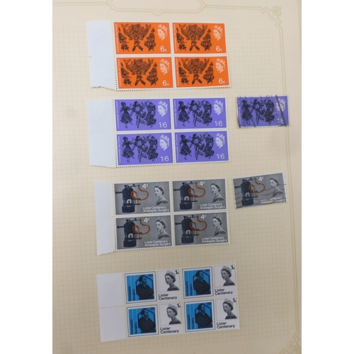 7045 - A worldwide stamp collection in four albums including 1 album of  GB with early phosphor sets, one a... 