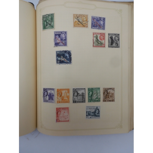 7045 - A worldwide stamp collection in four albums including 1 album of  GB with early phosphor sets, one a...