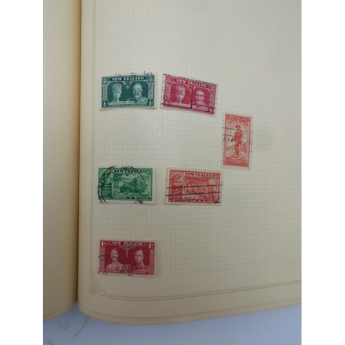 7045 - A worldwide stamp collection in four albums including 1 album of  GB with early phosphor sets, one a...