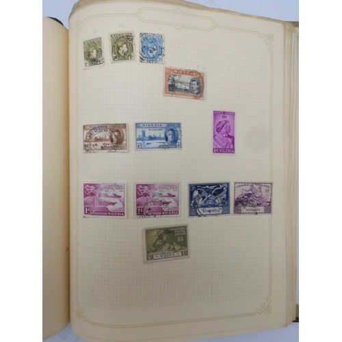 7045 - A worldwide stamp collection in four albums including 1 album of  GB with early phosphor sets, one a... 