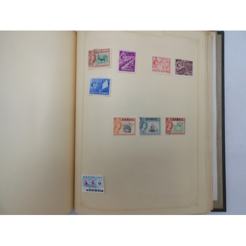 7045 - A worldwide stamp collection in four albums including 1 album of  GB with early phosphor sets, one a... 