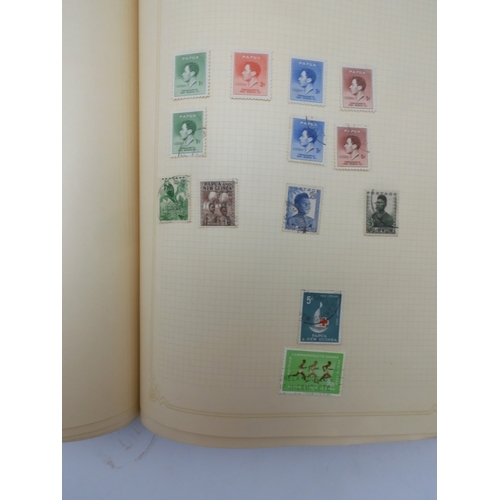 7045 - A worldwide stamp collection in four albums including 1 album of  GB with early phosphor sets, one a...