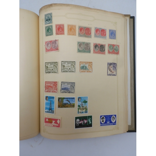 7045 - A worldwide stamp collection in four albums including 1 album of  GB with early phosphor sets, one a...