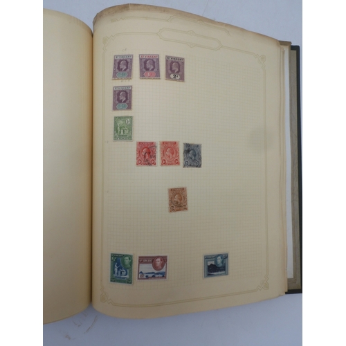 7045 - A worldwide stamp collection in four albums including 1 album of  GB with early phosphor sets, one a...