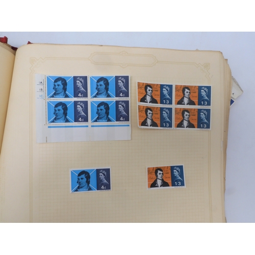 7045 - A worldwide stamp collection in four albums including 1 album of  GB with early phosphor sets, one a...