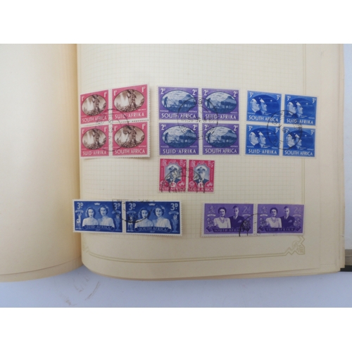 7045 - A worldwide stamp collection in four albums including 1 album of  GB with early phosphor sets, one a... 