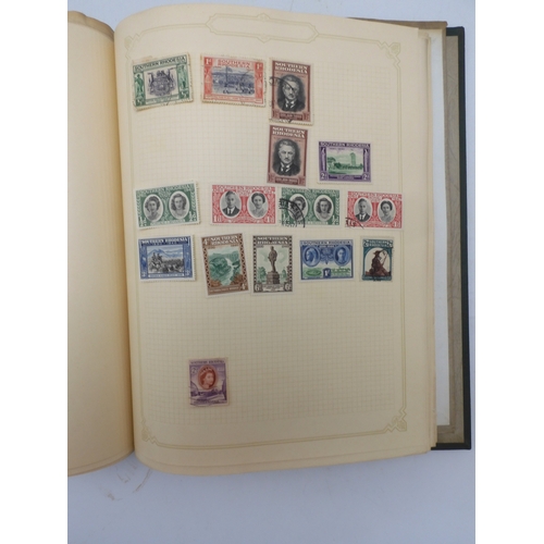 7045 - A worldwide stamp collection in four albums including 1 album of  GB with early phosphor sets, one a...