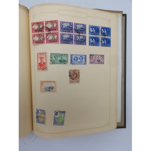 7045 - A worldwide stamp collection in four albums including 1 album of  GB with early phosphor sets, one a... 