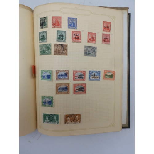 7045 - A worldwide stamp collection in four albums including 1 album of  GB with early phosphor sets, one a...