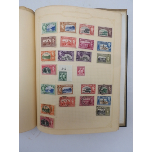 7045 - A worldwide stamp collection in four albums including 1 album of  GB with early phosphor sets, one a...