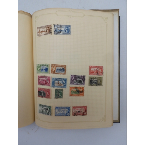 7045 - A worldwide stamp collection in four albums including 1 album of  GB with early phosphor sets, one a...