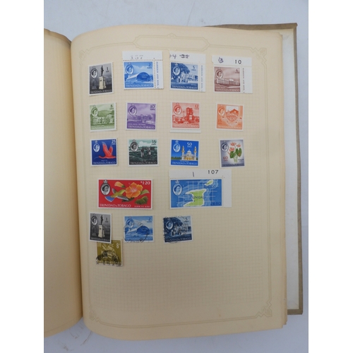 7045 - A worldwide stamp collection in four albums including 1 album of  GB with early phosphor sets, one a...