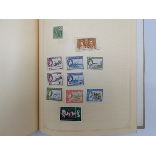 7045 - A worldwide stamp collection in four albums including 1 album of  GB with early phosphor sets, one a...