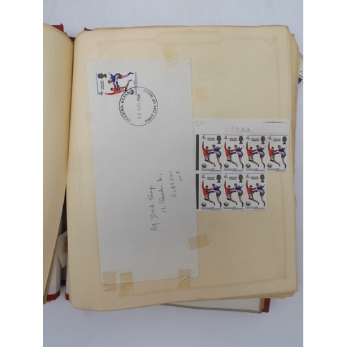 7045 - A worldwide stamp collection in four albums including 1 album of  GB with early phosphor sets, one a... 