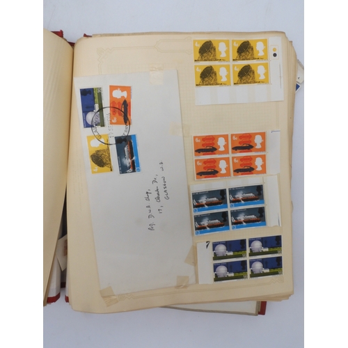 7045 - A worldwide stamp collection in four albums including 1 album of  GB with early phosphor sets, one a... 