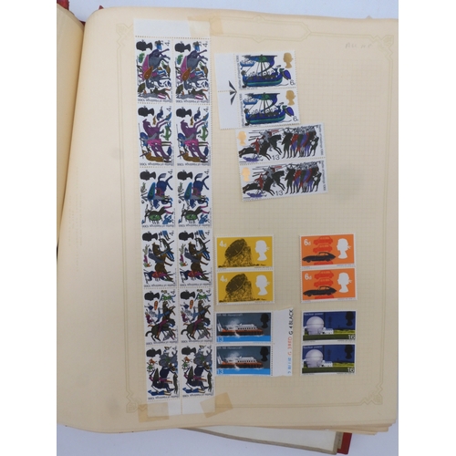 7045 - A worldwide stamp collection in four albums including 1 album of  GB with early phosphor sets, one a...