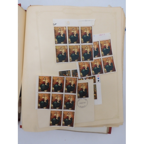 7045 - A worldwide stamp collection in four albums including 1 album of  GB with early phosphor sets, one a...