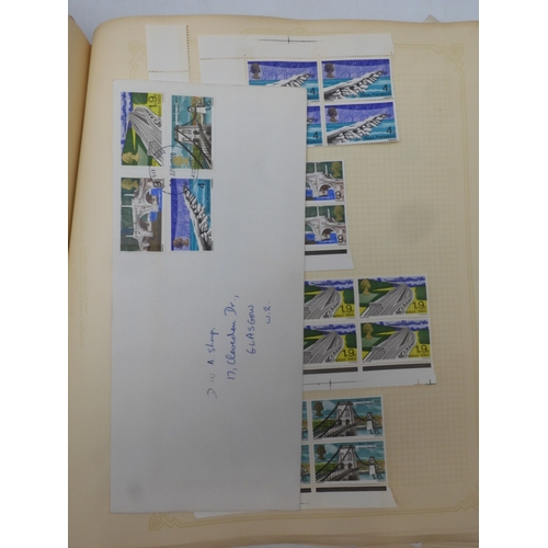 7045 - A worldwide stamp collection in four albums including 1 album of  GB with early phosphor sets, one a... 