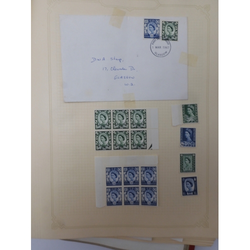 7045 - A worldwide stamp collection in four albums including 1 album of  GB with early phosphor sets, one a...