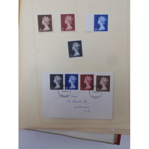 7045 - A worldwide stamp collection in four albums including 1 album of  GB with early phosphor sets, one a... 