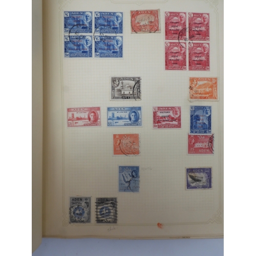 7045 - A worldwide stamp collection in four albums including 1 album of  GB with early phosphor sets, one a... 