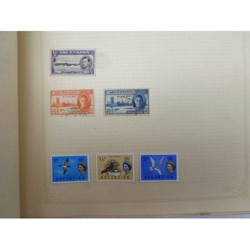 7045 - A worldwide stamp collection in four albums including 1 album of  GB with early phosphor sets, one a... 