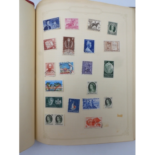 7045 - A worldwide stamp collection in four albums including 1 album of  GB with early phosphor sets, one a... 