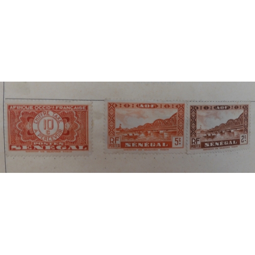 7047 - A worldwide and colonies stamp collection in three stock-books to include Tannou Touva 1937 airmail,...