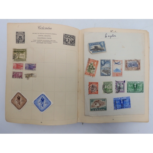 7055 - A worldwide stamp collection in a Nelson Stamp Album...