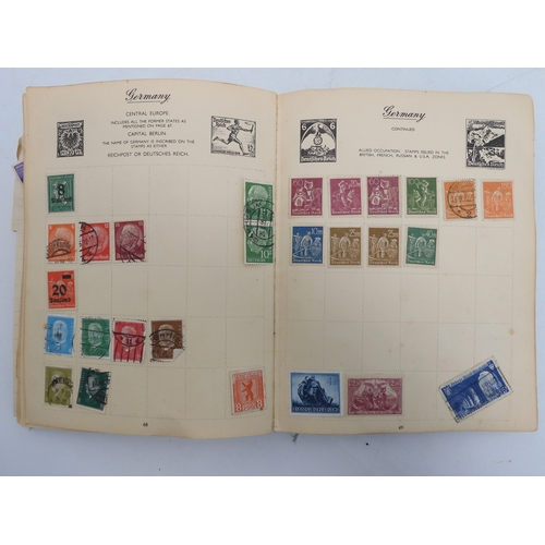 7055 - A worldwide stamp collection in a Nelson Stamp Album...