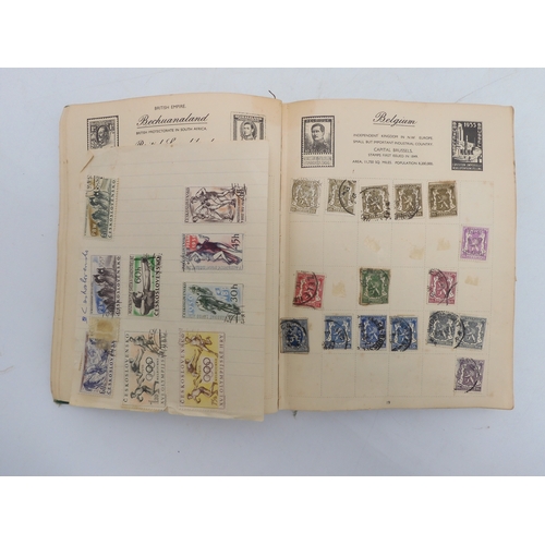 7055 - A worldwide stamp collection in a Nelson Stamp Album...