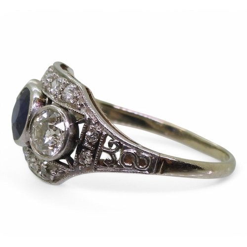 2800 - A SAPPHIRE & DIAMOND RINGin the American Art Deco style, mounted in white metal with galleried m... 