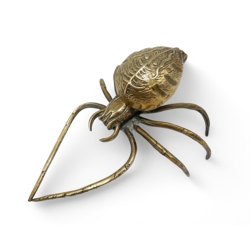 2151A - A NOVELTY VICTORIAN BRASS INKWELLin the form of a spider, the hinged abdomen opening to a well, regi... 