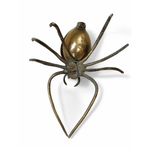 2151A - A NOVELTY VICTORIAN BRASS INKWELLin the form of a spider, the hinged abdomen opening to a well, regi... 