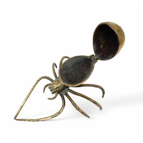 2151A - A NOVELTY VICTORIAN BRASS INKWELLin the form of a spider, the hinged abdomen opening to a well, regi... 