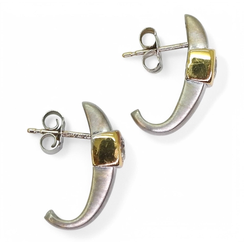 700 - A pair of 18ct white and yellow gold diamond earrings, set with estimated approx 0.50cts of brillian... 