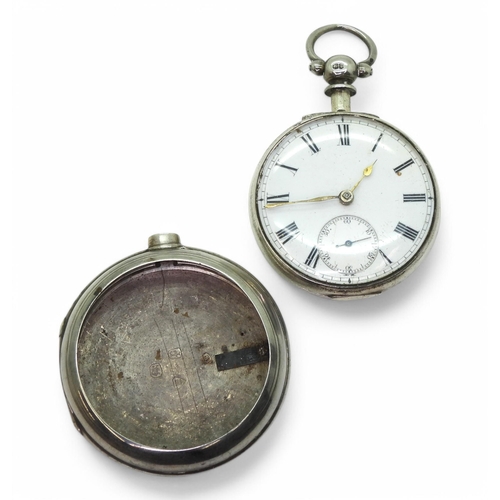 708 - A silver pair cased pocket watch hallmarked London 1870 to both cases, the mechanism signed Dan Ferg... 