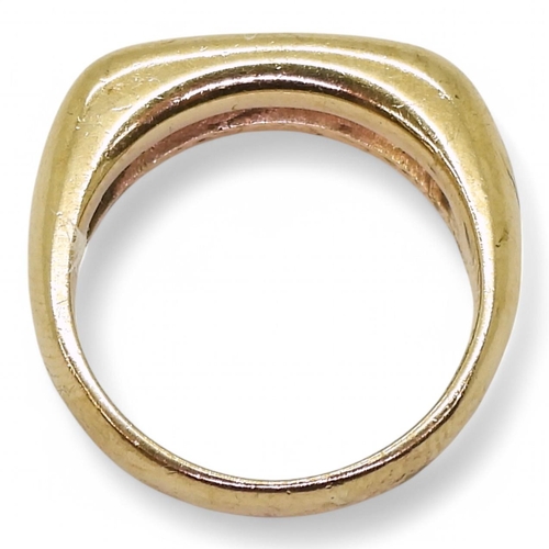 751 - A 9ct gold eternity ring with a rounded square profile channel set with estimated approx 0.20cts of ... 