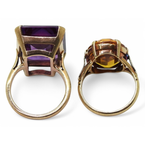 754 - Two 9ct gold rings, a large faux amethyst of approx 19.9mm x 14.9mm, size L, faux citrine size K1/2,... 