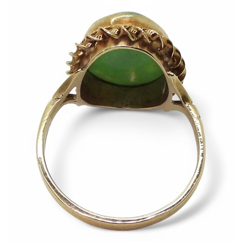 756 - A 9ct gold green gem set ring, size M1/2, weight 3.2gms