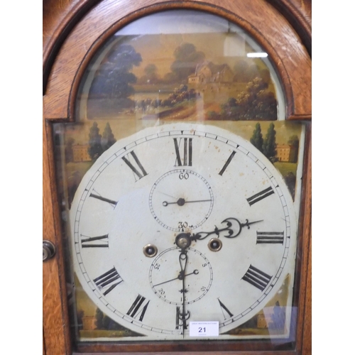 21 - A 19th century oak cased longcase clock with painted face with white dial bearing Roman numerals and... 