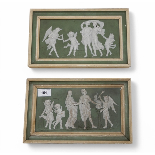 154 - A pair of Jasperware plaques depicting classical scenes