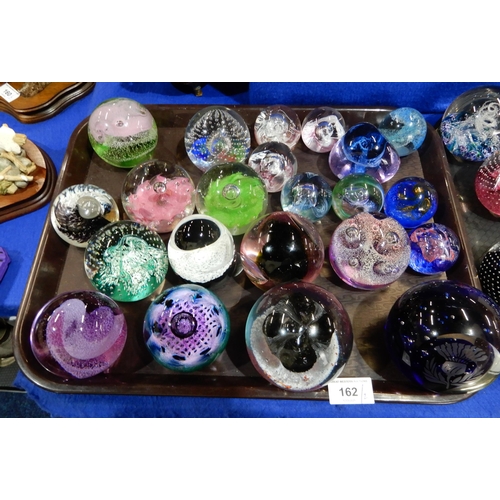 162 - A large quantity of Caithness and other glass paperweights